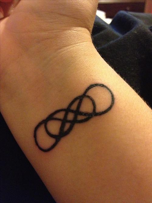 om infinity tattoo,Om Infinity Tattoo: A Journey into the World of Body Art